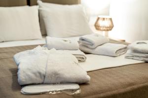 Postel nebo postele na pokoji v ubytování Pelagus Luxury Villas