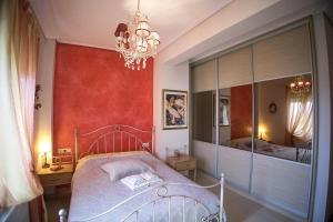 Ένα ή περισσότερα κρεβάτια σε δωμάτιο στο Venia House Marathos