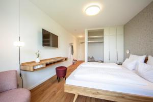 Postel nebo postele na pokoji v ubytování Seehörnle Bio Hotel & Gasthaus