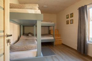 Postel nebo postele na pokoji v ubytování Bačkis camp