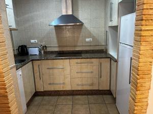 Η κουζίνα ή μικρή κουζίνα στο Apartament Layla La Mata +2 φωτογραφίες