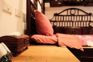Postel nebo postele na pokoji v ubytování 莊同益民宿 Zhuang Tongyi Homestay
