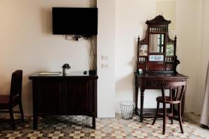 TV a/nebo společenská místnost v ubytování 莊同益民宿 Zhuang Tongyi Homestay