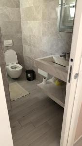 Koupelna v ubytování Meri Rooms