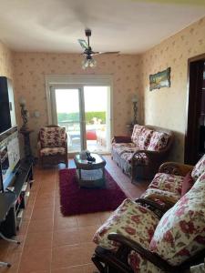 TV/trung tâm giải trí tại Beachfront Villa North Coast +12 ảnh