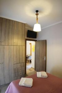 Posteľ alebo postele v izbe v ubytovaní Centro Bianco Lefkada