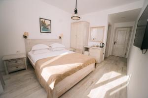 Postel nebo postele na pokoji v ubytování Hotel Pirate Old Town