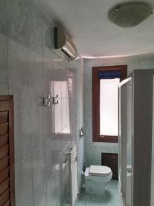 Koupelna v ubytování La Casa dello Spirito e del Tempo + 2 fotografie