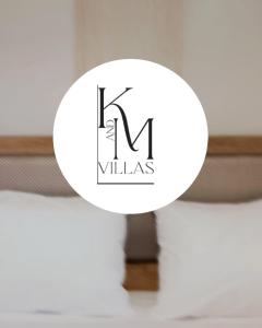 Postel nebo postele na pokoji v ubytování K&M Villas