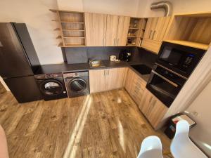 A kitchen or kitchenette at Apartmán TTT