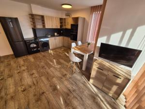 A kitchen or kitchenette at Apartmán TTT