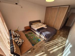 A bed or beds in a room at Apartmán TTT
