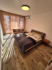 A bed or beds in a room at Apartmán TTT