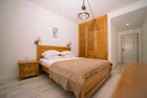 Postel nebo postele na pokoji v ubytování Hotel Pirate Old Town