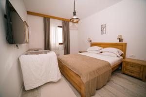 Postel nebo postele na pokoji v ubytování Hotel Pirate Old Town