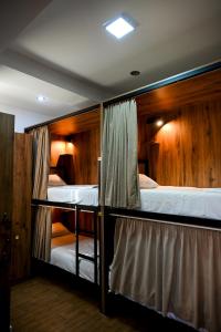 a couple of bunk beds in a room at StarHostel in Kutaisi