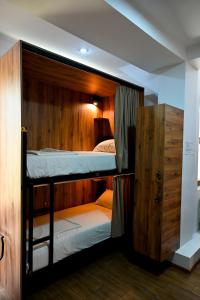 a couple of bunk beds in a room at StarHostel in Kutaisi