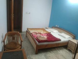 Postel nebo postele na pokoji v ubytování HOTEL Cedar Heritage