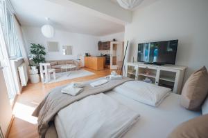 Postel nebo postele na pokoji v ubytování Bezauberndes Studio mit privatem Garten