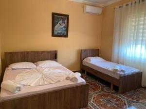 Ένα ή περισσότερα κρεβάτια σε δωμάτιο στο The Hideaway Guesthouse