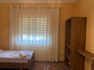 Ένα ή περισσότερα κρεβάτια σε δωμάτιο στο The Hideaway Guesthouse