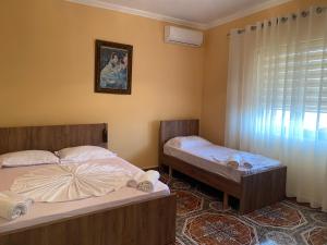 Ένα ή περισσότερα κρεβάτια σε δωμάτιο στο The Hideaway Guesthouse