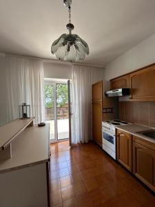 Kuchyň nebo kuchyňský kout v ubytování Apartment Ljubica