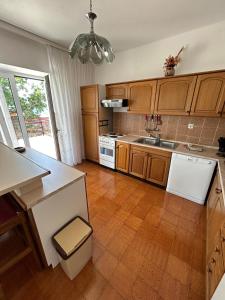 Kuchyň nebo kuchyňský kout v ubytování Apartment Ljubica
