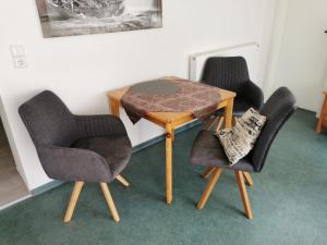 Ein Sitzbereich in der Unterkunft Rosenhof in Binz