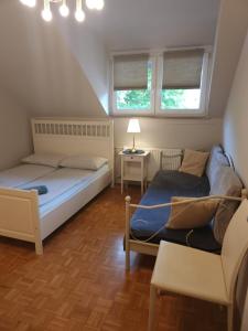 Postel nebo postele na pokoji v ubytování Avrora House FREE parking in OLD TOWN