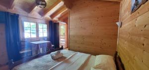 Postel nebo postele na pokoji v ubytování Hotel Panorama Dajt