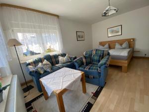 Ein Bett oder Betten in einem Zimmer der Unterkunft Rosenhof in Binz