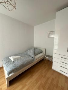 Postel nebo postele na pokoji v ubytování Apartment Schorndorf