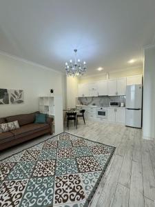 Η κουζίνα ή μικρή κουζίνα στο A-Six Apartment ЖК "Новый Степной"