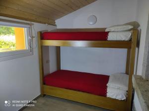 Postel nebo postele na pokoji v ubytování Chilometro 29 terra