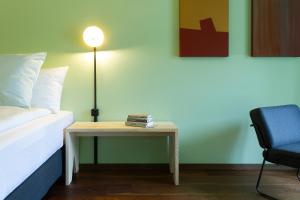 Postel nebo postele na pokoji v ubytování Hotel Schlüssel