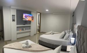 מיטה או מיטות בחדר ב-110 Loft