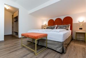 Voodi või voodid majutusasutuse Hotel Sole - Sonne toas