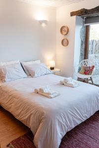 Postel nebo postele na pokoji v ubytování CASAS DA MORGADINHA - Casas de Férias e Turismo Rural