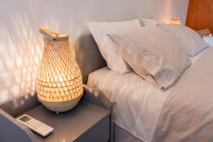 Postel nebo postele na pokoji v ubytování CASAS DA MORGADINHA - Casas de Férias e Turismo Rural