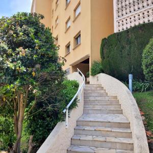 a set of stairs leading to a building at Vue Mer Capitou in Mandelieu-la-Napoule