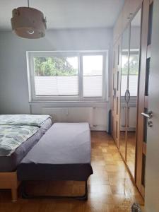 Postel nebo postele na pokoji v ubytování Großes Apartment perfekt für Familien - Gästecard inklusive