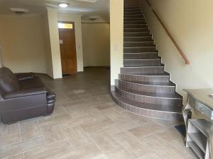 Posezení v ubytování Pitypang Apartman