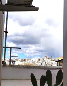 a view of a city from a window at Home Pugliese in Ceglie Messapica