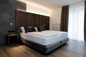Voodi või voodid majutusasutuse Hotel Sole - Sonne toas