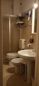 Ванная комната в Piccolo hotel holiday center