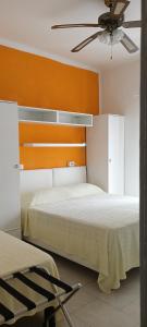 Кровать или кровати в номере Piccolo hotel holiday center