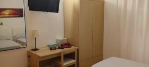 Кровать или кровати в номере Piccolo hotel holiday center