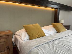 Letto o letti in una camera di Wellness Pension 7