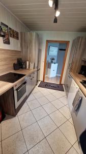 Kuchyň nebo kuchyňský kout v ubytování Ferienwohnung Balzereit